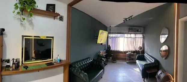Área de espera da Brotta Barbearia Naturalista